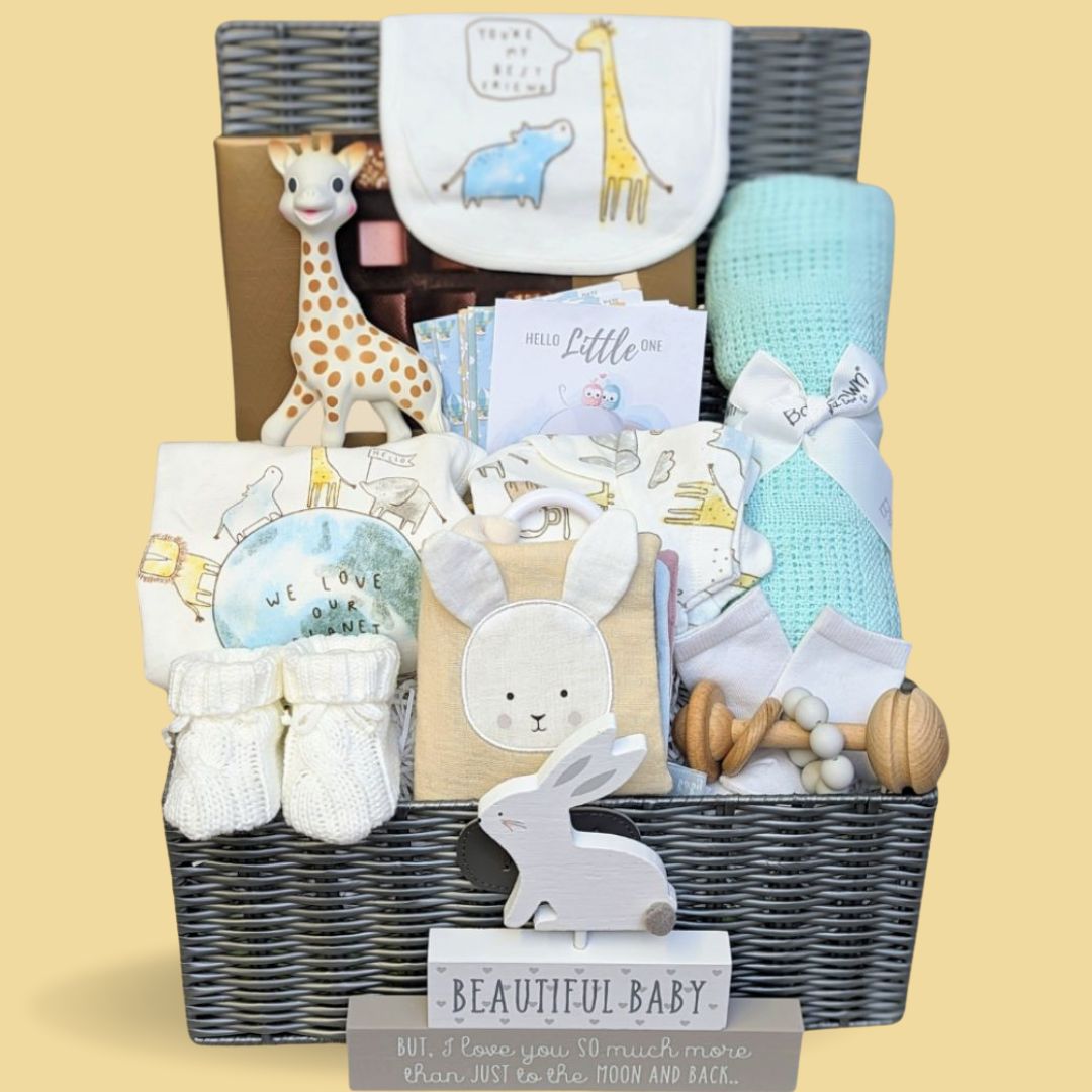 unisex new baby hamper with clothing set, milestone cards, baby book, nursery plaque and teething toys for baby.