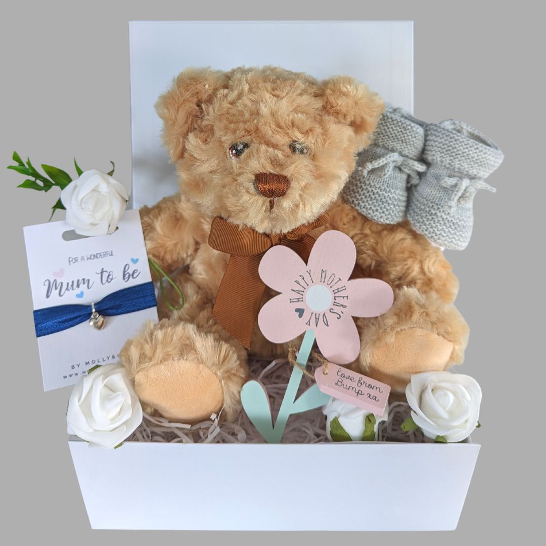 mum to be hamper gift for mum on mothers day. Features a teddy, baby booties, bracelet and plaque.