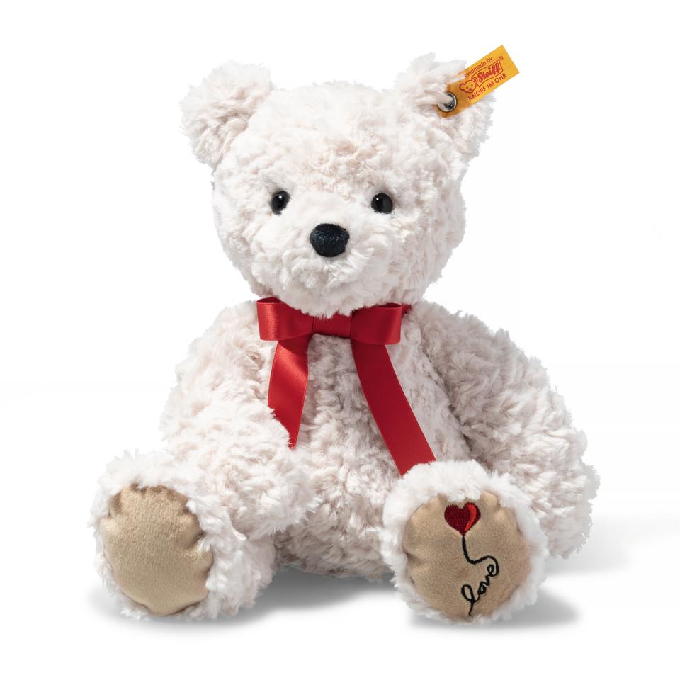 A 30cm cream teddy bear from the Jimmy Range by toy make Steiff with Love embroidered on the foot