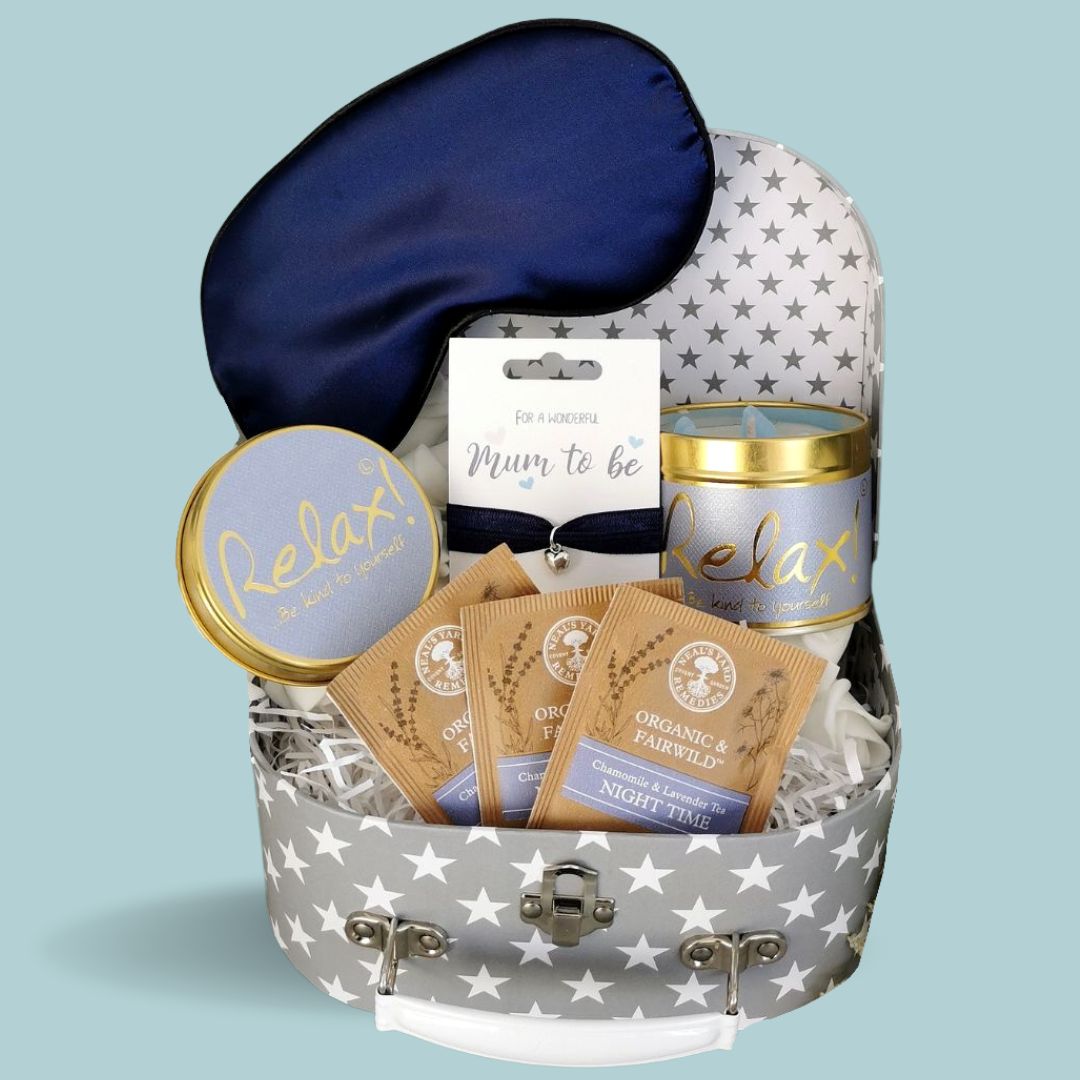 Mum to be hamper trunk with candle, bracelet, eye mask and treat for mum.