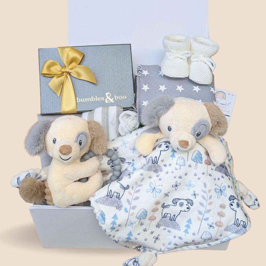 mum to be gift box with chocolates, bracelet, muslin, bib, booties and toys for the baby.
