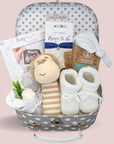 Mum to be hamper gift with monkey rattle for baby, baby knit booties, baby hat and mittens. Gifts also for mum.