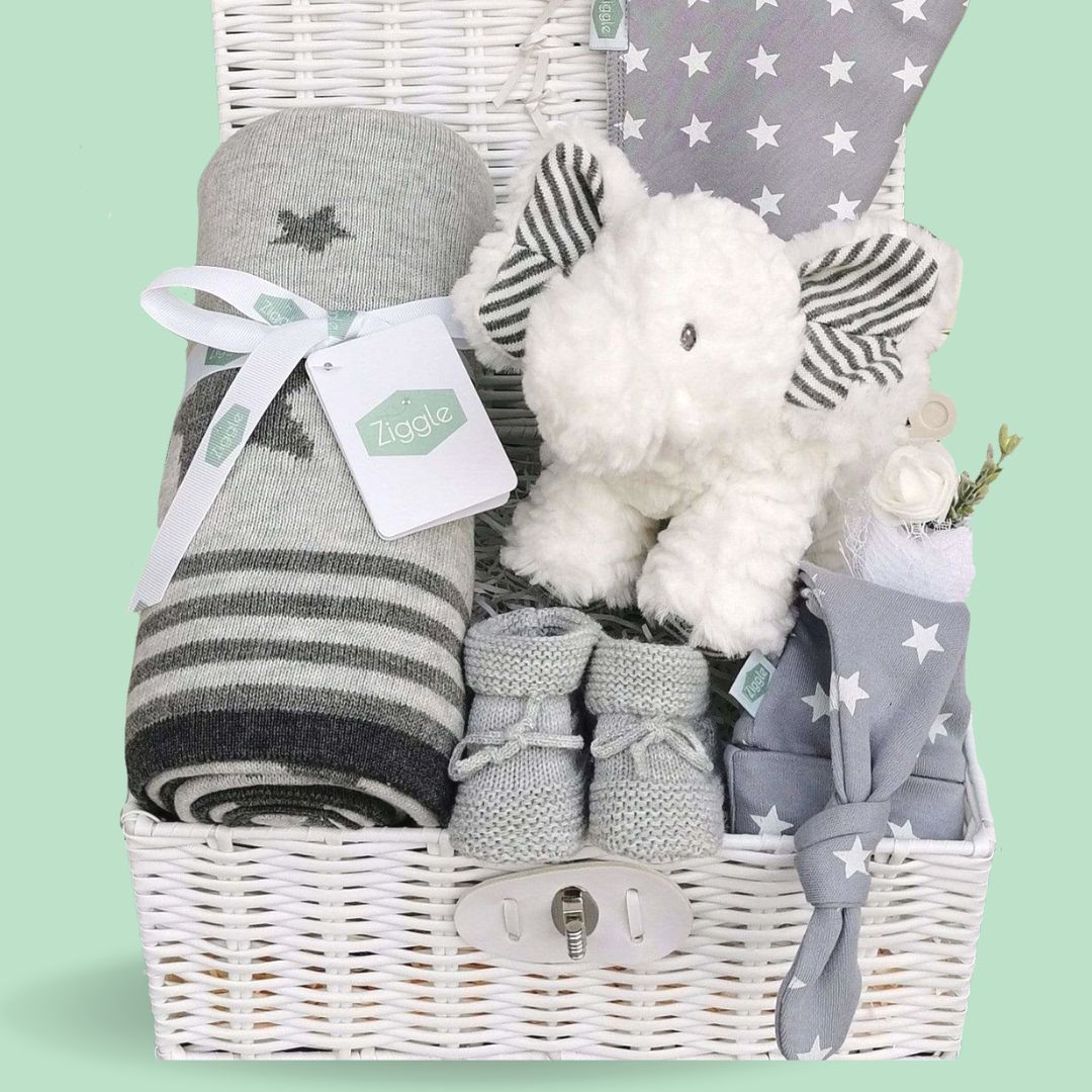New Baby Hamper Gift in neutral unisex grey & white with Elephant soft toy, baby blanket and star bib & hat set.