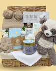 new mum hamper with gifts for mum and also baby. Includes panda bear, hat, booties, chocolates, candle, body wash and nursery hanging plaque.