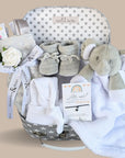 new mum hamper gifts with elephant comforter, baby booties, baby blanket and baby hat.