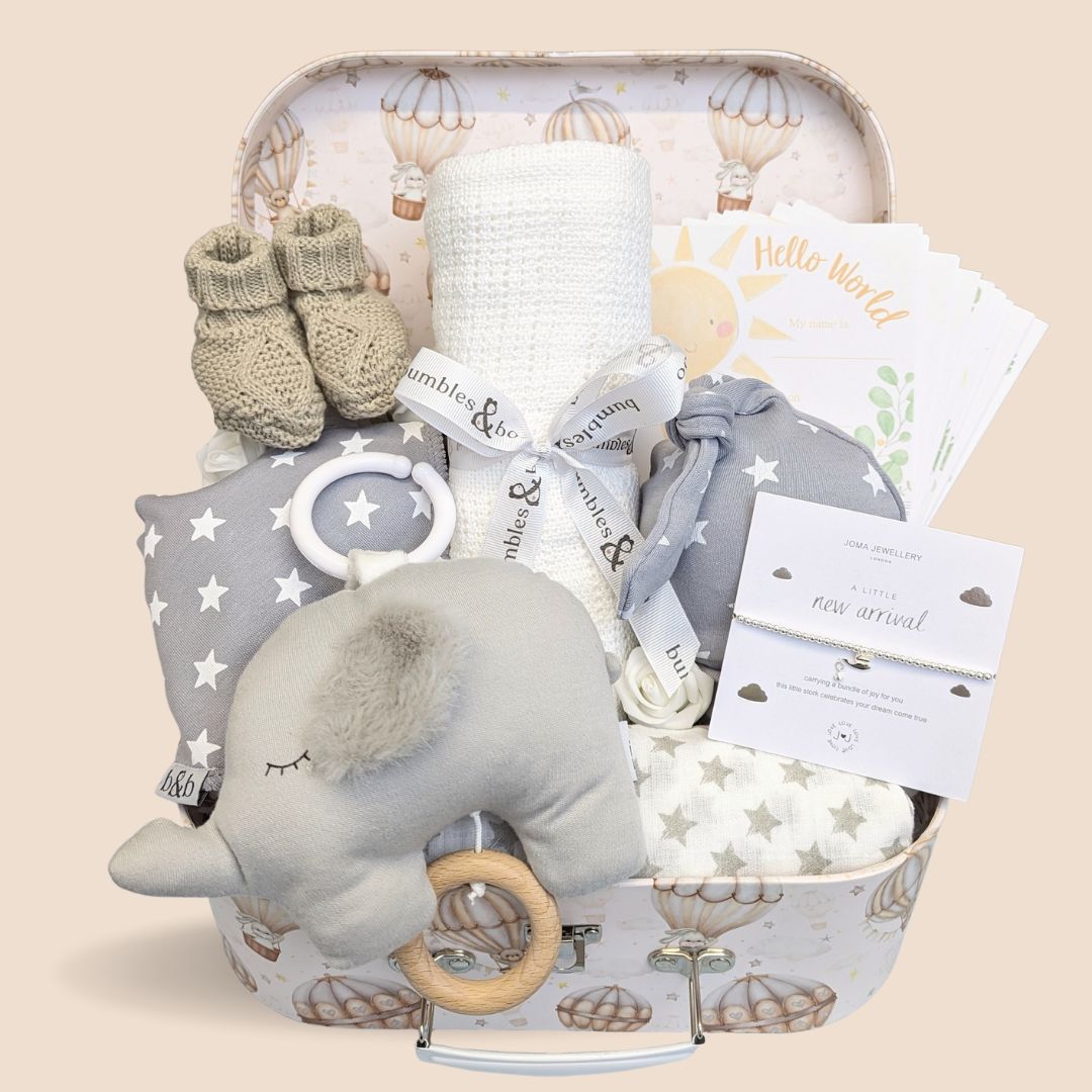 New mum and baby keepsake hamper gift with musical elephant soft toy, baby blanket and joma bracelet for a new mum.