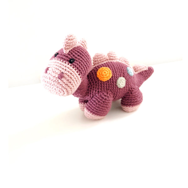 Handmade organic purple dinosaur baby rattle toy with a soft texture, embellished with yellow and colorful spots.