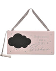 A pink chalk countdown plaque with chalk to help count down the days until a sibling is a bib sister.