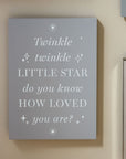 Grey matt plaque which can be hung on the wall or free standing with the words twinkle twinkle little star, do you know how loved you are?