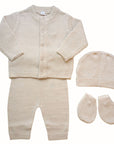 Neutral four piece coloured unisex knitted gift set in a biscuit cream colour