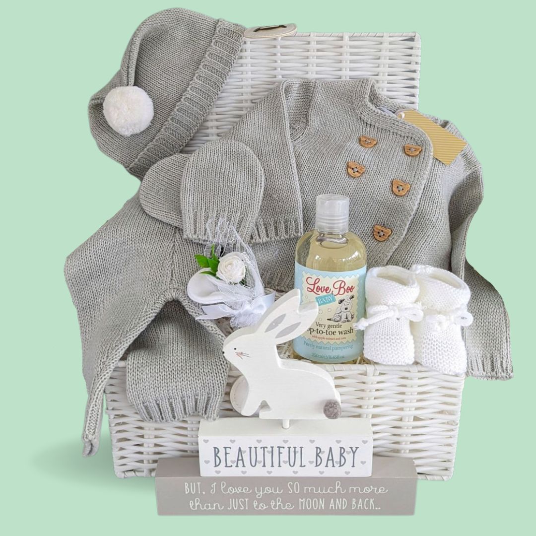 New baby hamper basket gift with unisex clothing and organic baby wash. 