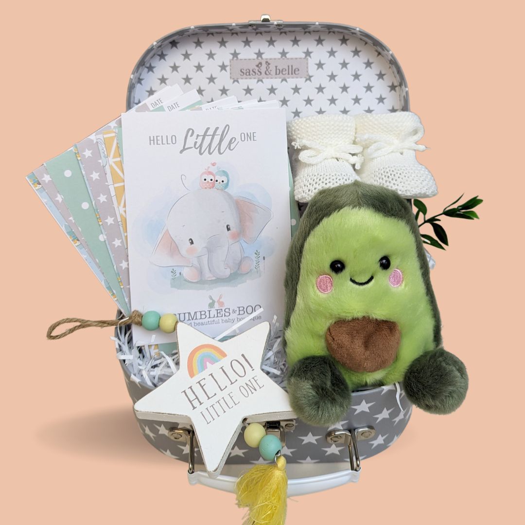 baby hamper gift with avocado soft toy, baby milestone cards, baby booties and hanging plaque.