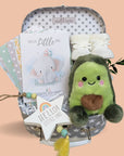 baby hamper gift with avocado soft toy, baby milestone cards, baby booties and hanging plaque.