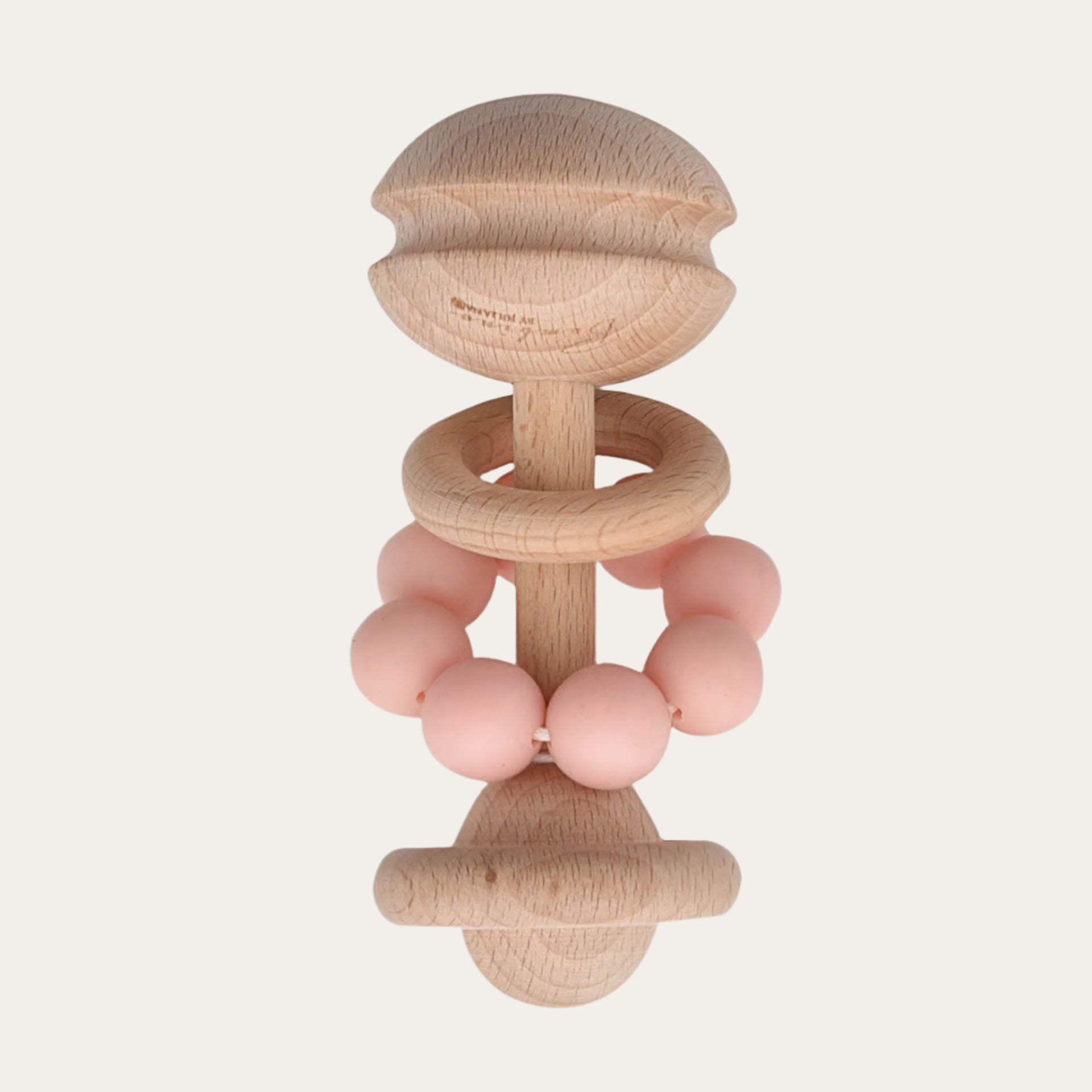 Wooden teething baby toy with a ring of pink beads